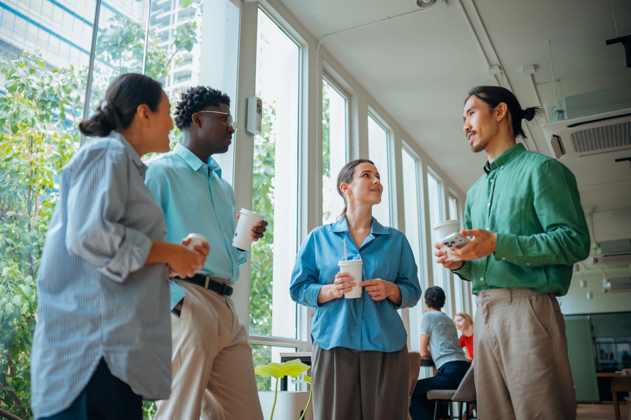 Professional leadership team in discussion during a strategic planning meeting